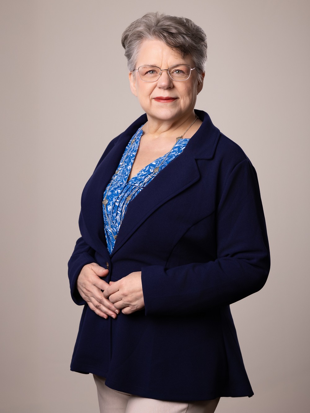 Wendy Cary - 202502 - 3x4 14 Wendy Cary standing with her hands clasped at her waist